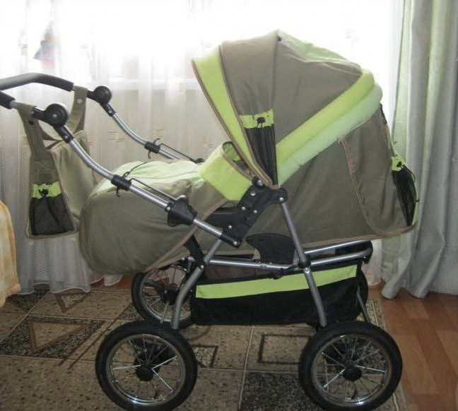 Не серовато ли для нашей ягодки?Коляска.