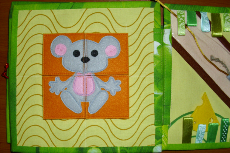 Развивающая книжка с котиком