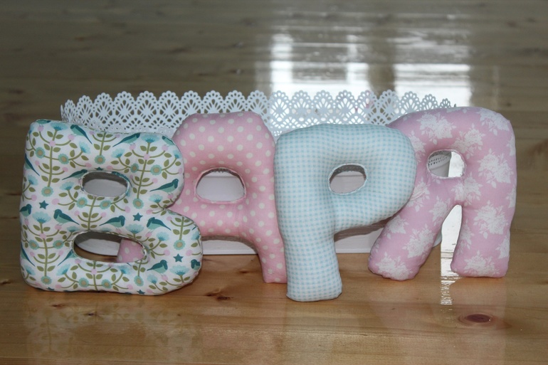 Буквы из ткани.