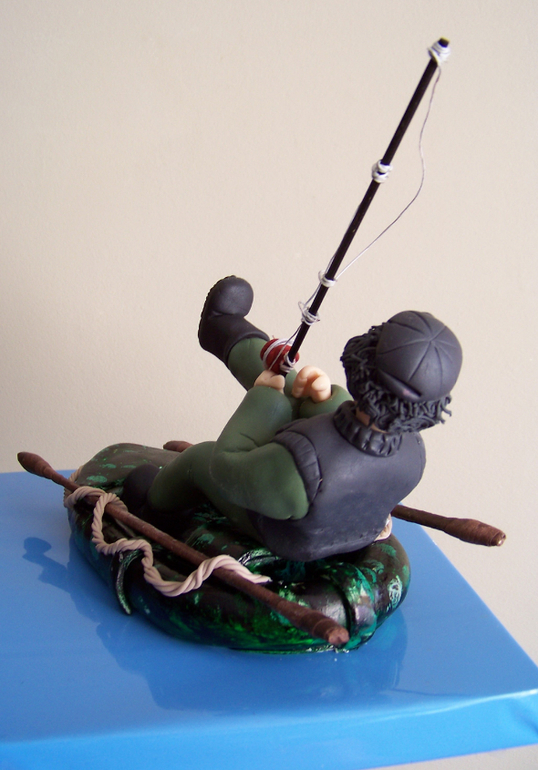 фигурка рыболов