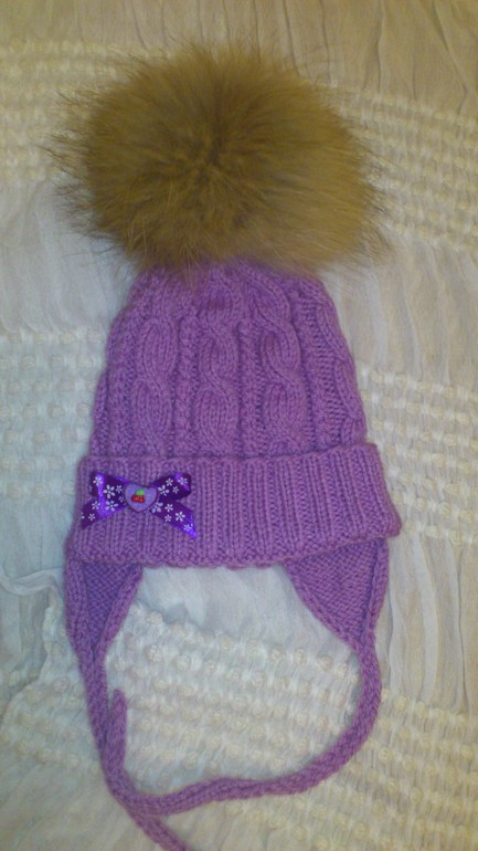 Шапка узором косы.