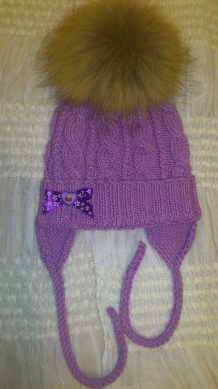 шапка косами.