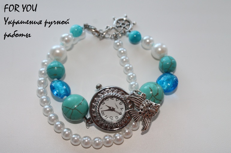 Часы с рыбкой