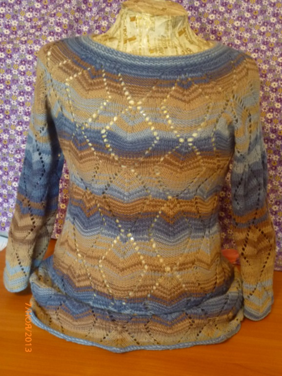 И ещё пара давних вязалок. Куртка из меха и платье.