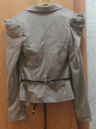 Пиджак светлый новый