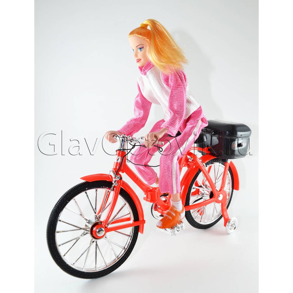 Кукла на велосипеде