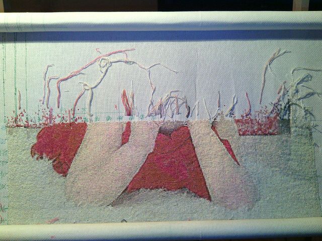 Процесс вышивки портрета внучки